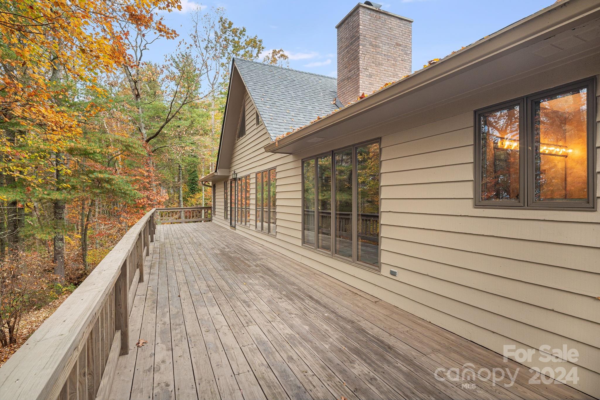 56 Whitaker View Road Fairview, NC 28730 - Photo 5 of 34 a view of balcony and wooden floor