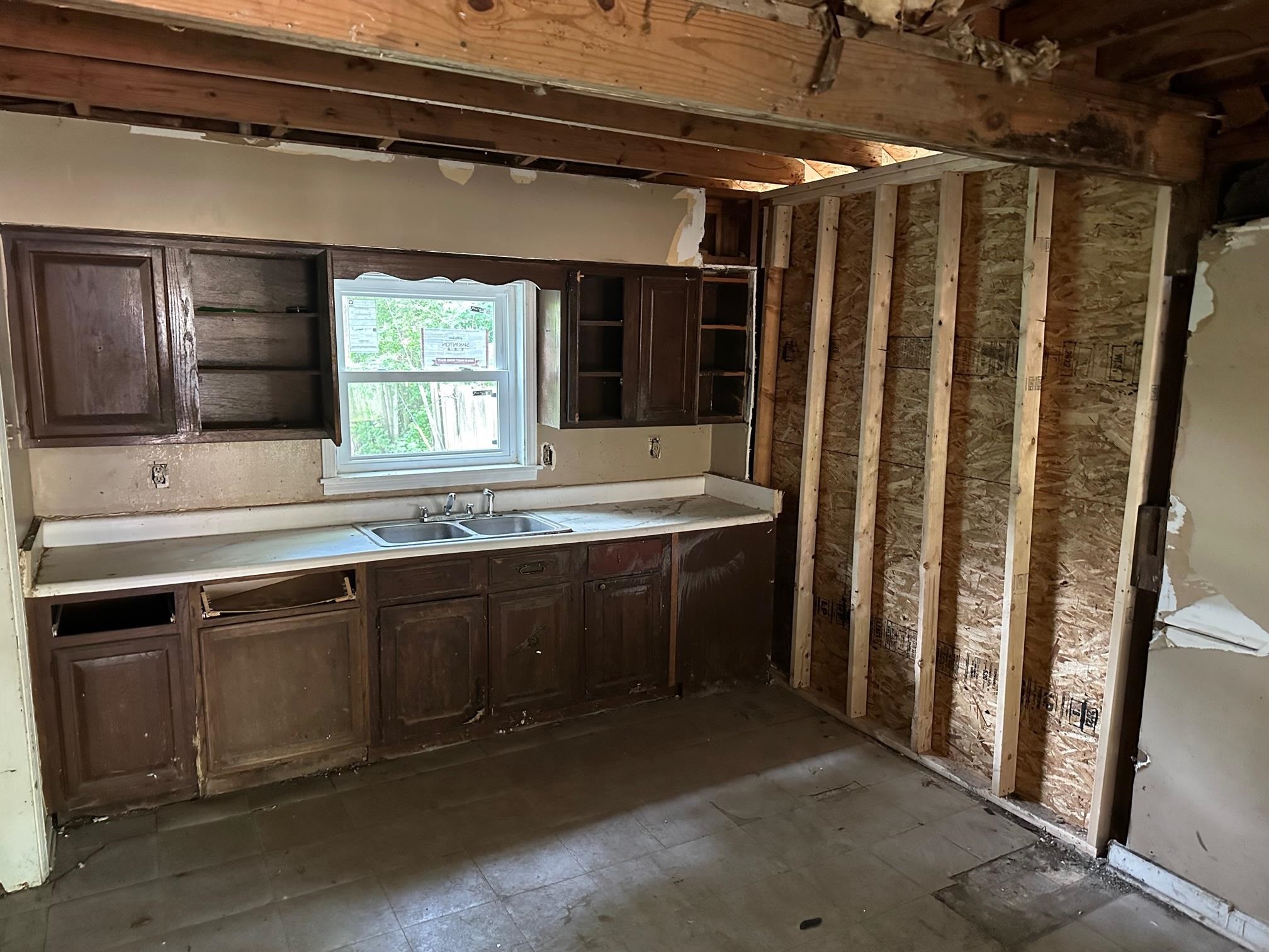 4483 Yale Road Memphis, TN 38128 - Photo 3 of 10 a kitchen with a sink and a window
