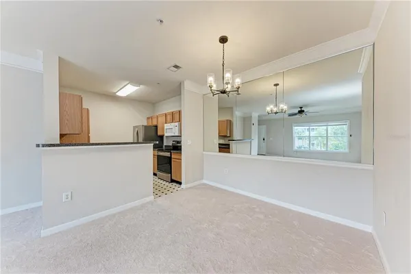 a view of a kitchen with a sink and dishwasher kitchen view