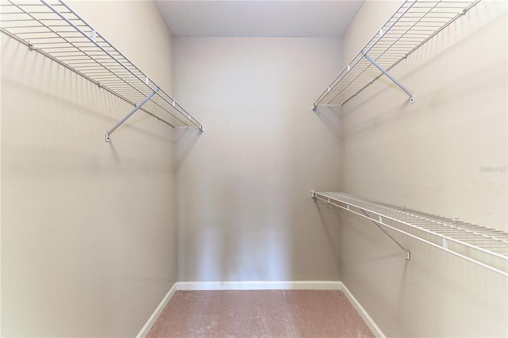 4802 51st Street West, Unit 1122 Bradenton, FL 34210 - Photo 22 of 37 a view of a room with racks on the wall