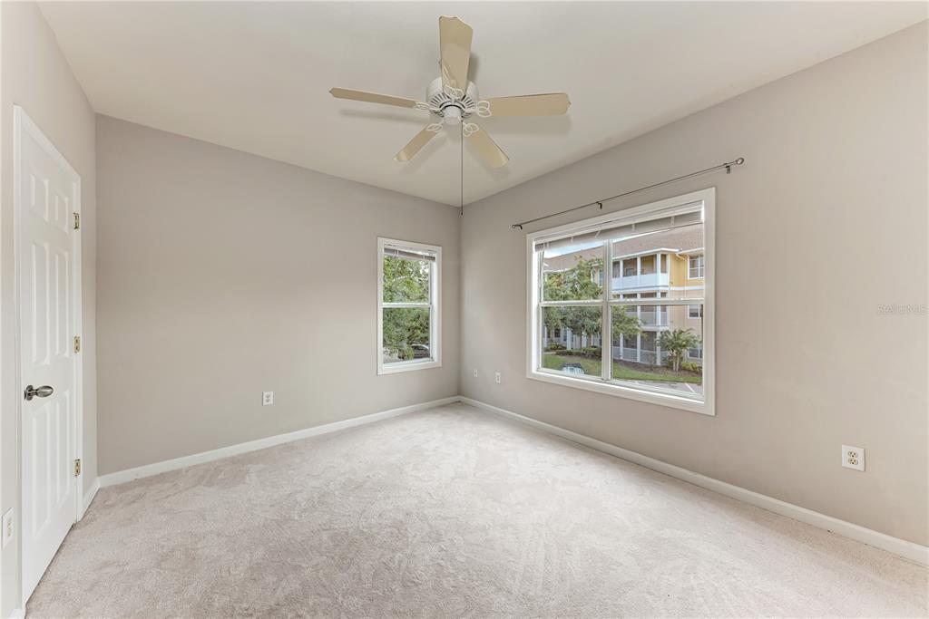 4802 51st Street West, Unit 1122 Bradenton, FL 34210 - Photo 27 of 37 a view of an empty room with a window