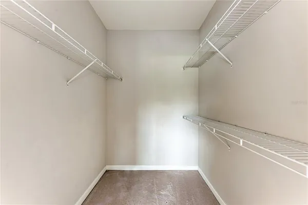 a view of a room with racks on the wall