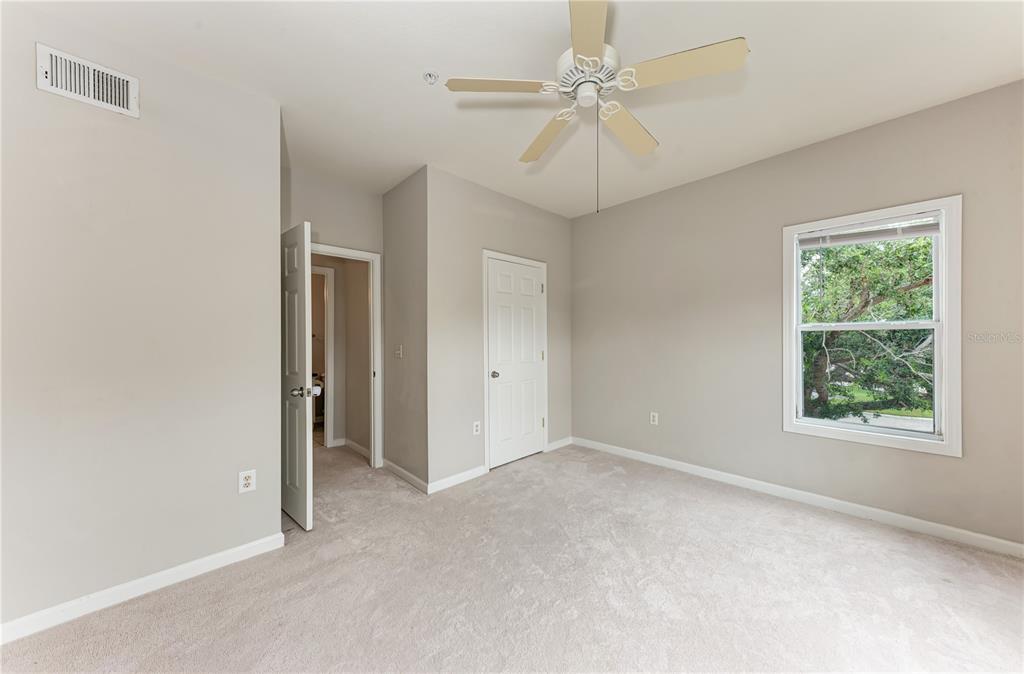 4802 51st Street West, Unit 1122 Bradenton, FL 34210 - Photo 33 of 37 a view of an empty room with a window
