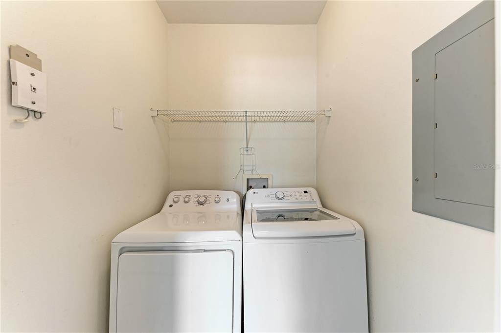 4802 51st Street West, Unit 1122 Bradenton, FL 34210 - Photo 34 of 37 a utility room with dryer and washer