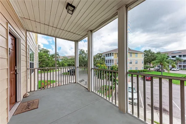 a view of a porch with a big yard