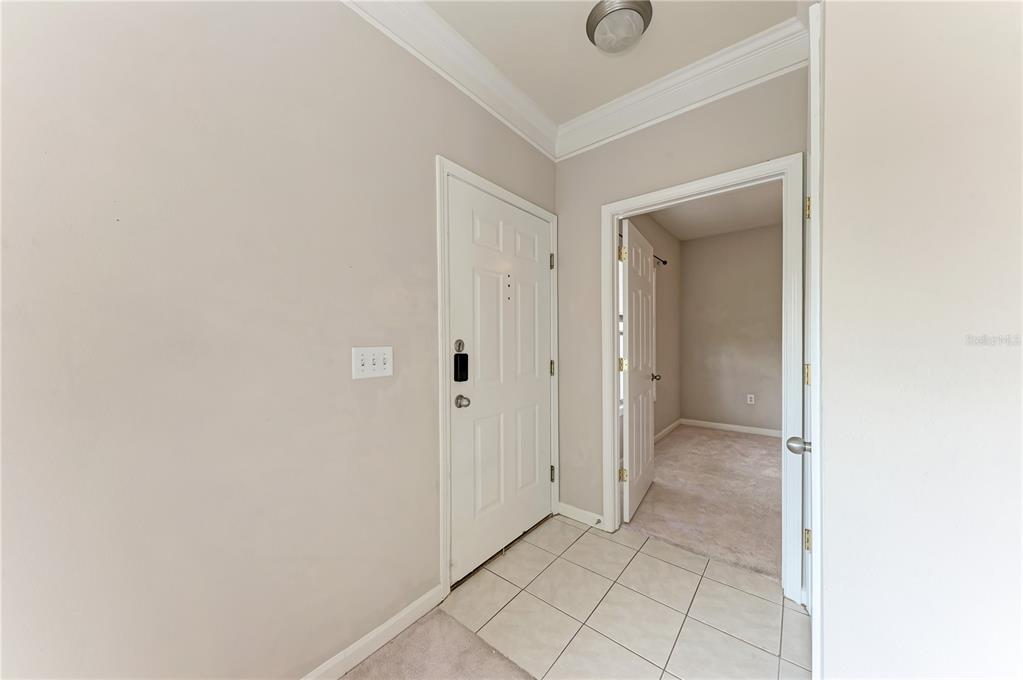 4802 51st Street West, Unit 1122 Bradenton, FL 34210 - Photo 9 of 37 a view of a hallway