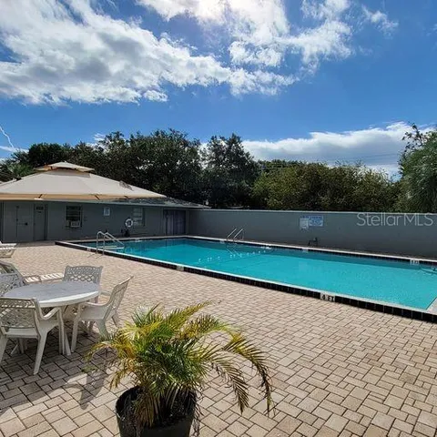 a view of a terrace with a yard