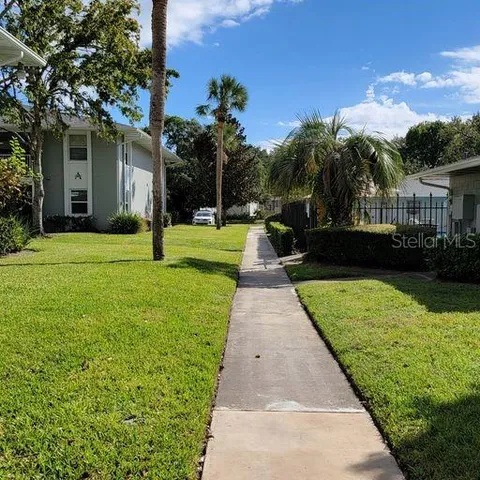 a view of a backyard with green space