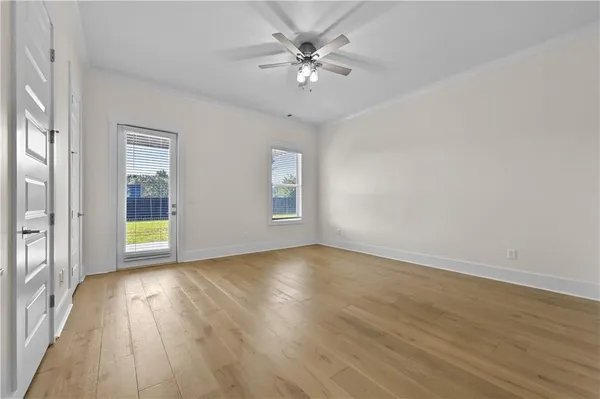 a view of living room with furniture and a window