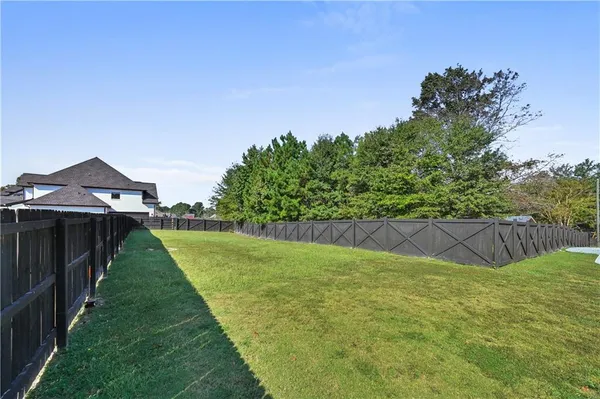 a house view with a garden space