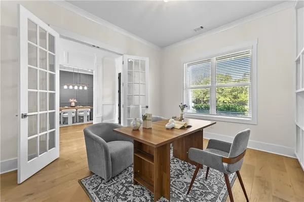 a kitchen with a table and chairs
