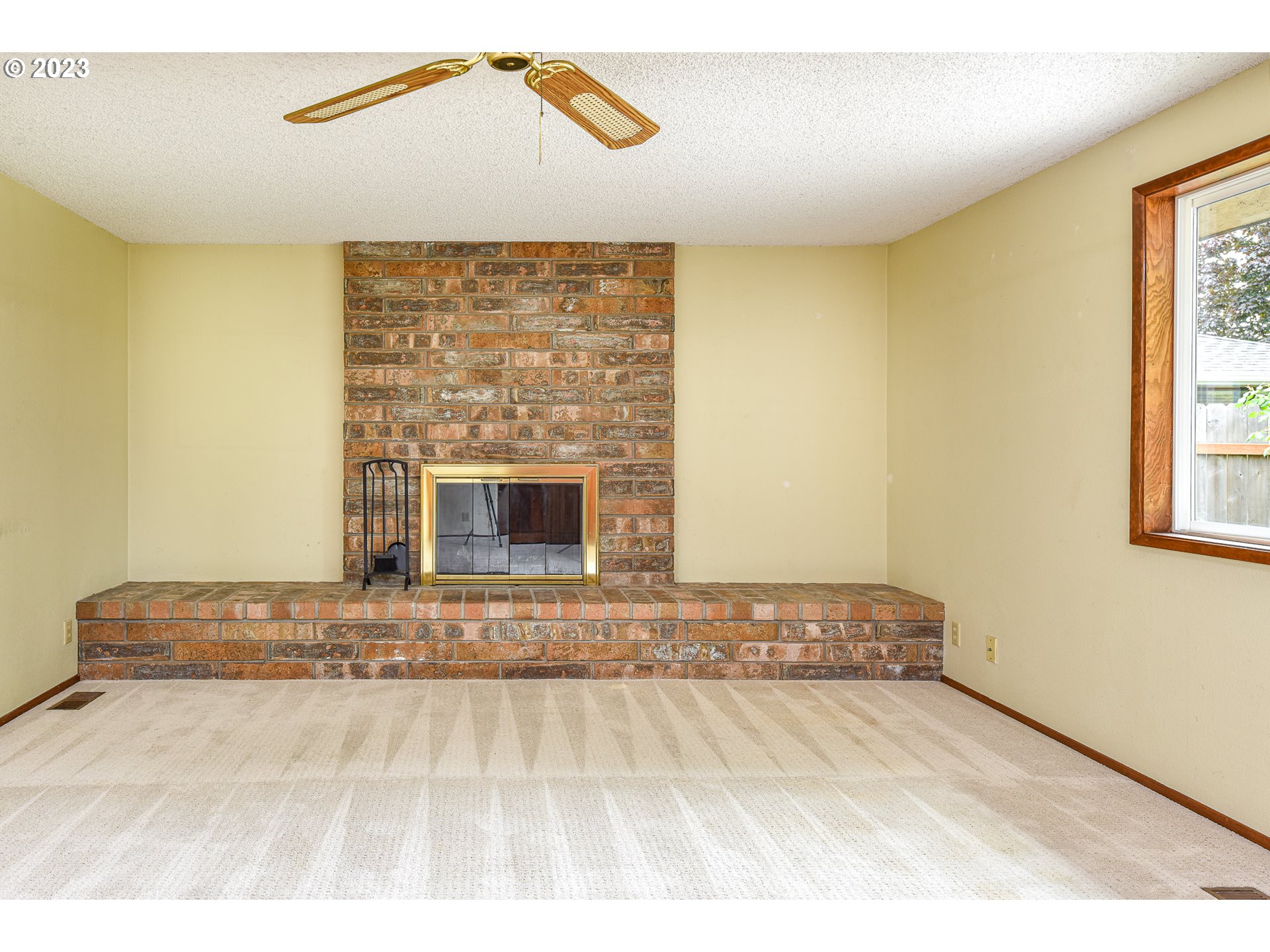2466 Erin Way Eugene, OR 97408 - Photo 16 of 38 a view of a livingroom with a fireplace