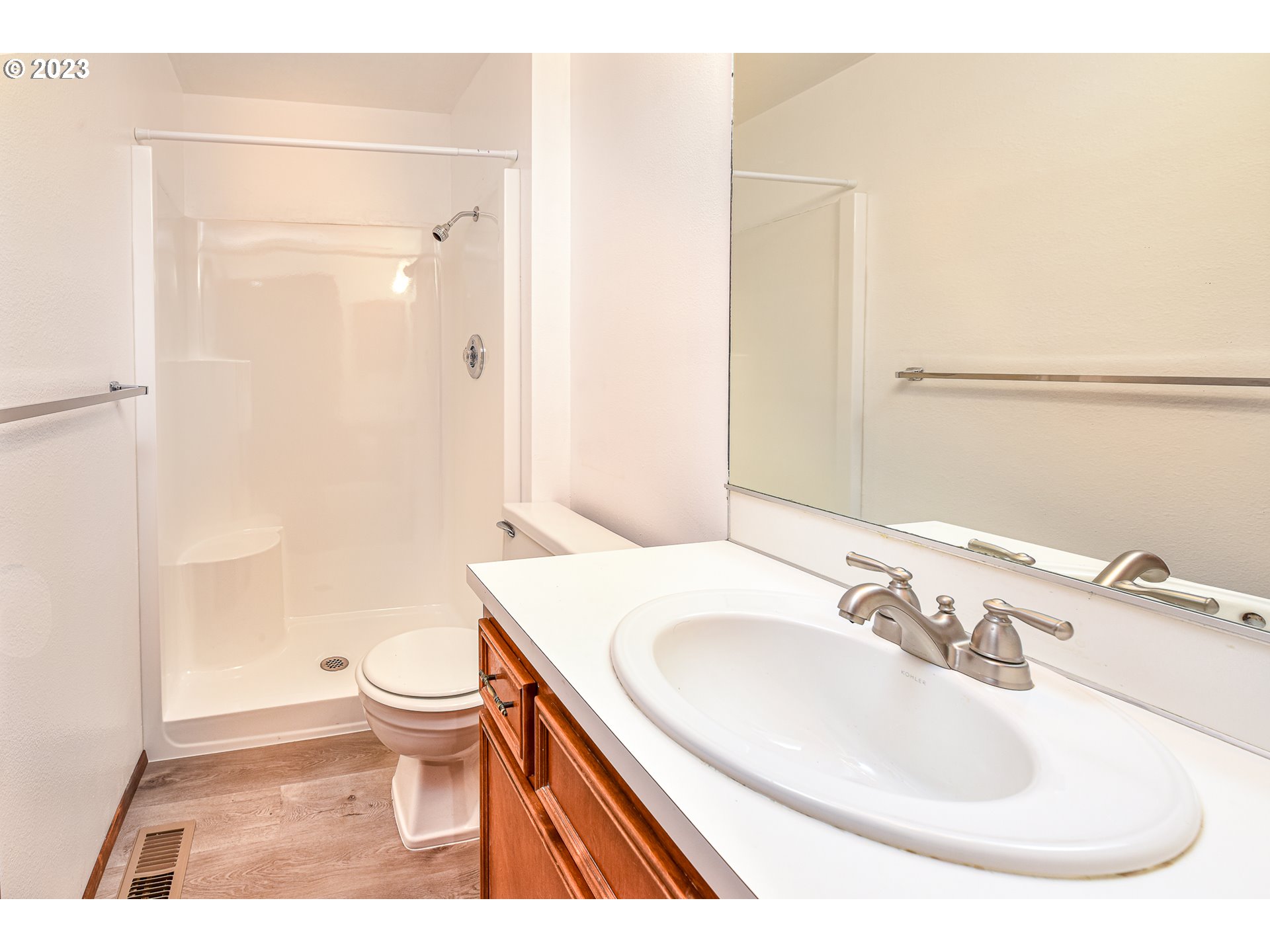 2466 Erin Way Eugene, OR 97408 - Photo 23 of 38 a bathroom with a sink a toilet and shower