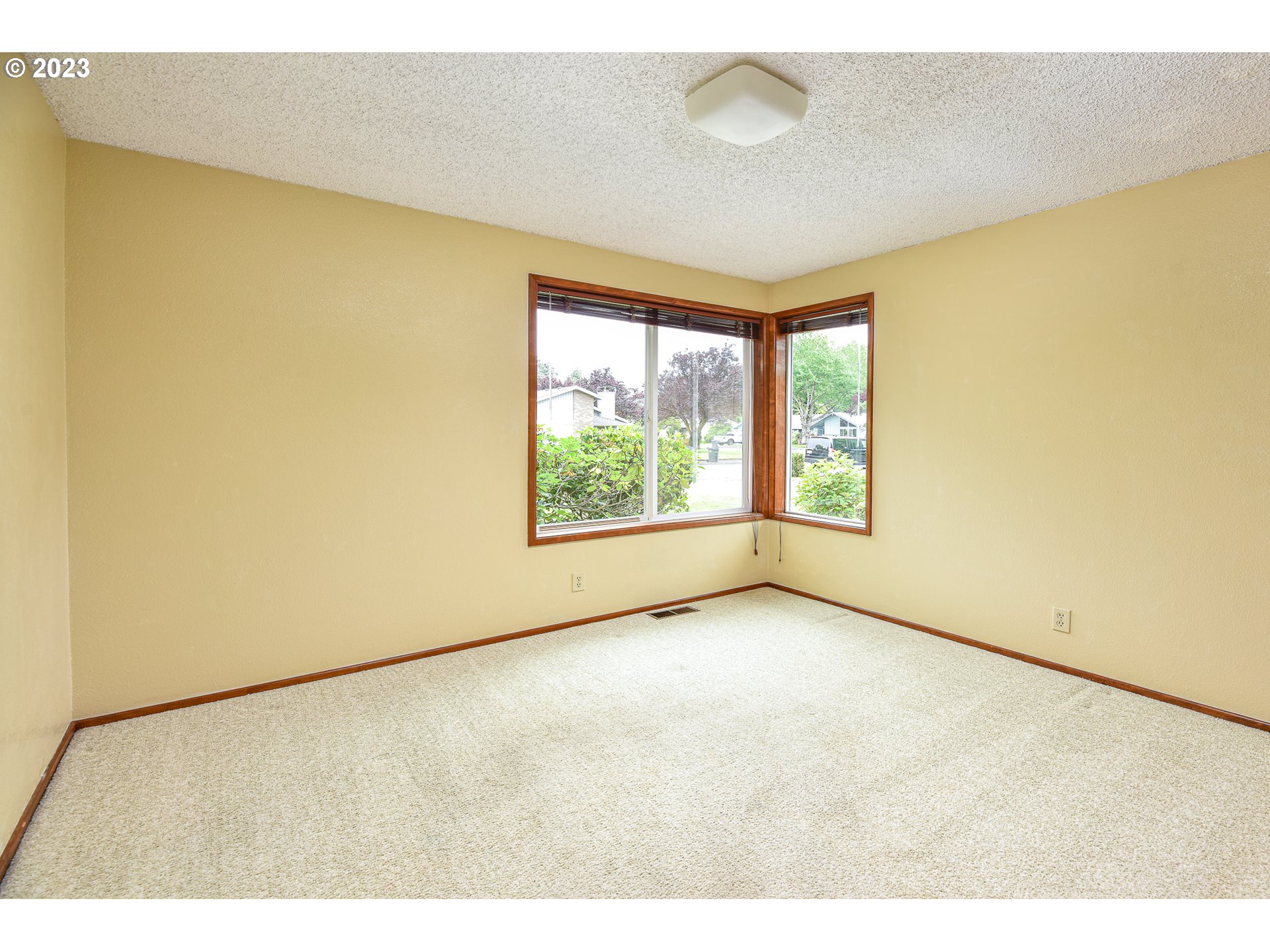 2466 Erin Way Eugene, OR 97408 - Photo 24 of 38 a view of an empty room with a window