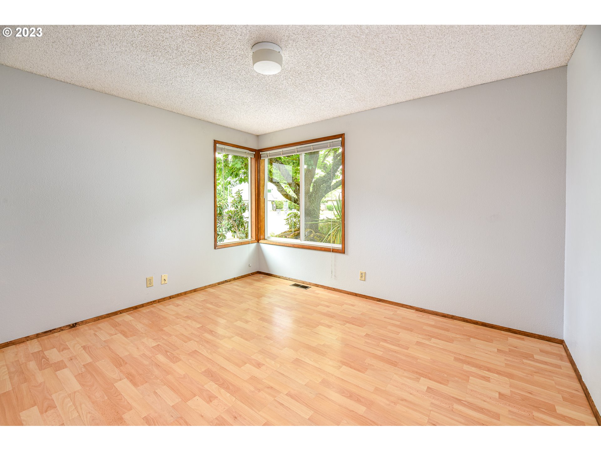 2466 Erin Way Eugene, OR 97408 - Photo 27 of 38 a view of an empty room with a window
