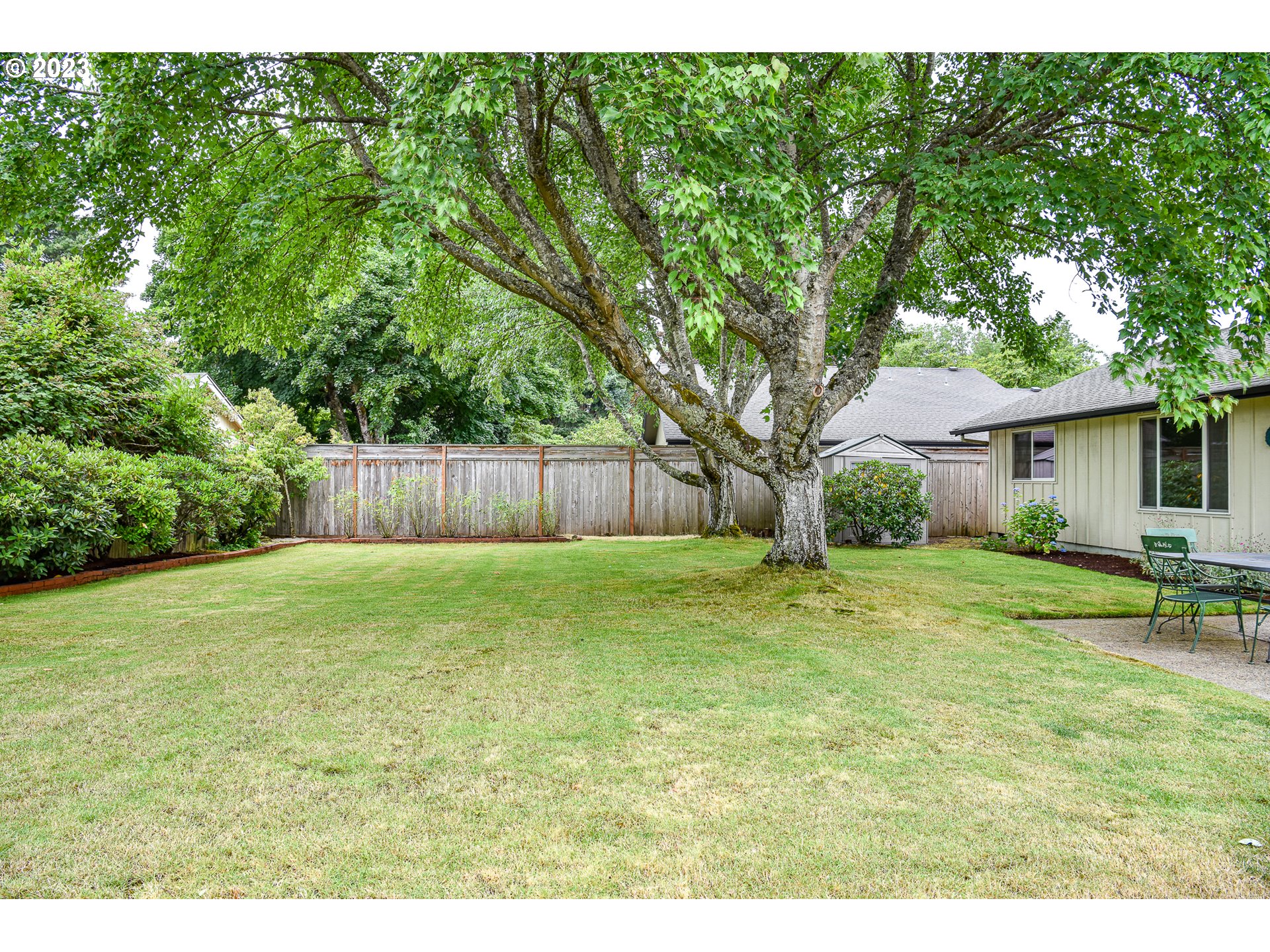 2466 Erin Way Eugene, OR 97408 - Photo 30 of 38 a view of a backyard with a garden