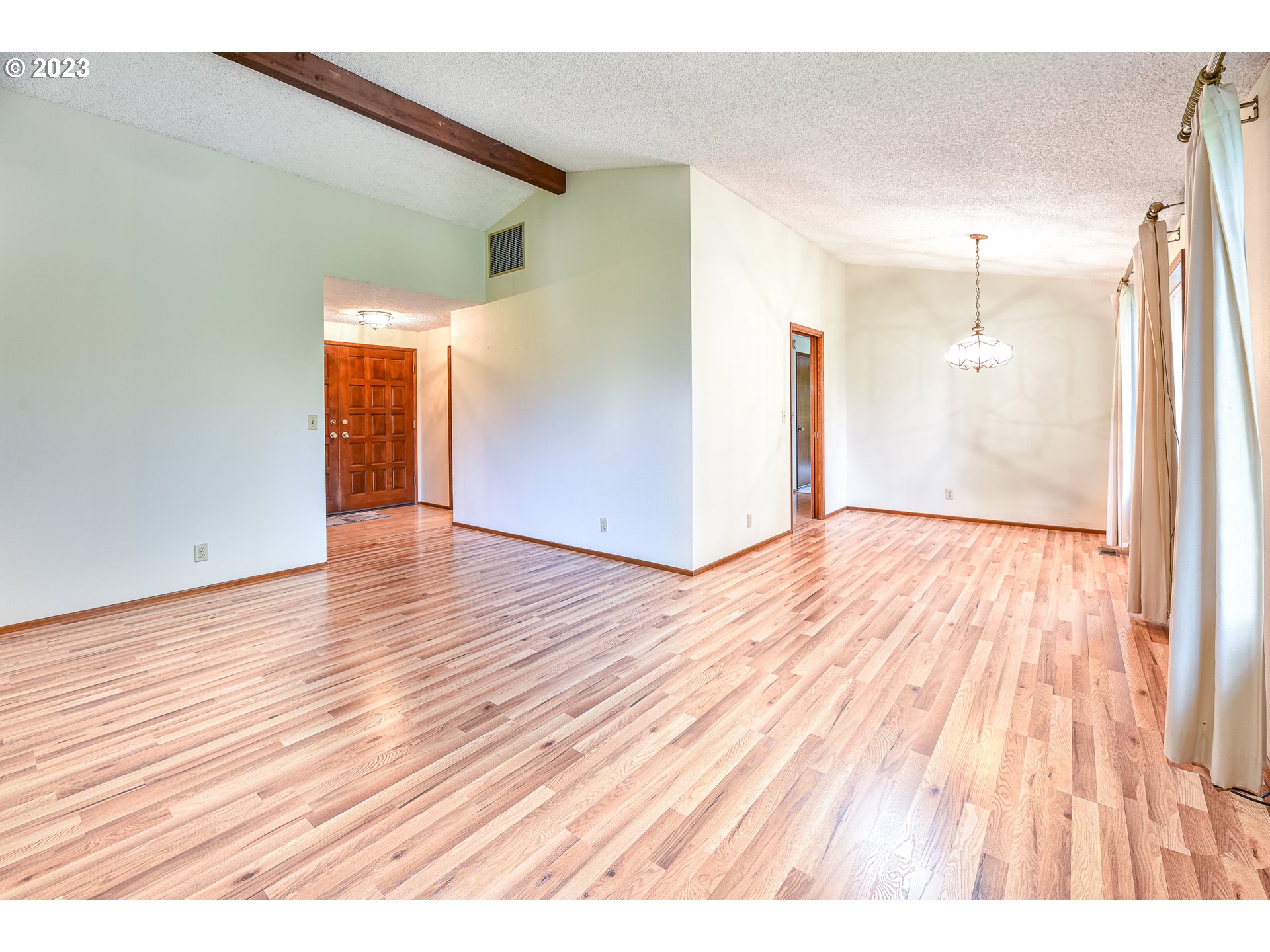 2466 Erin Way Eugene, OR 97408 - Photo 6 of 38 a view of empty room with wooden floor