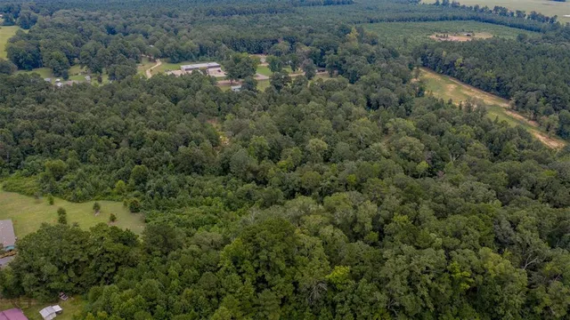 an aerial view of residential house with outdoor space