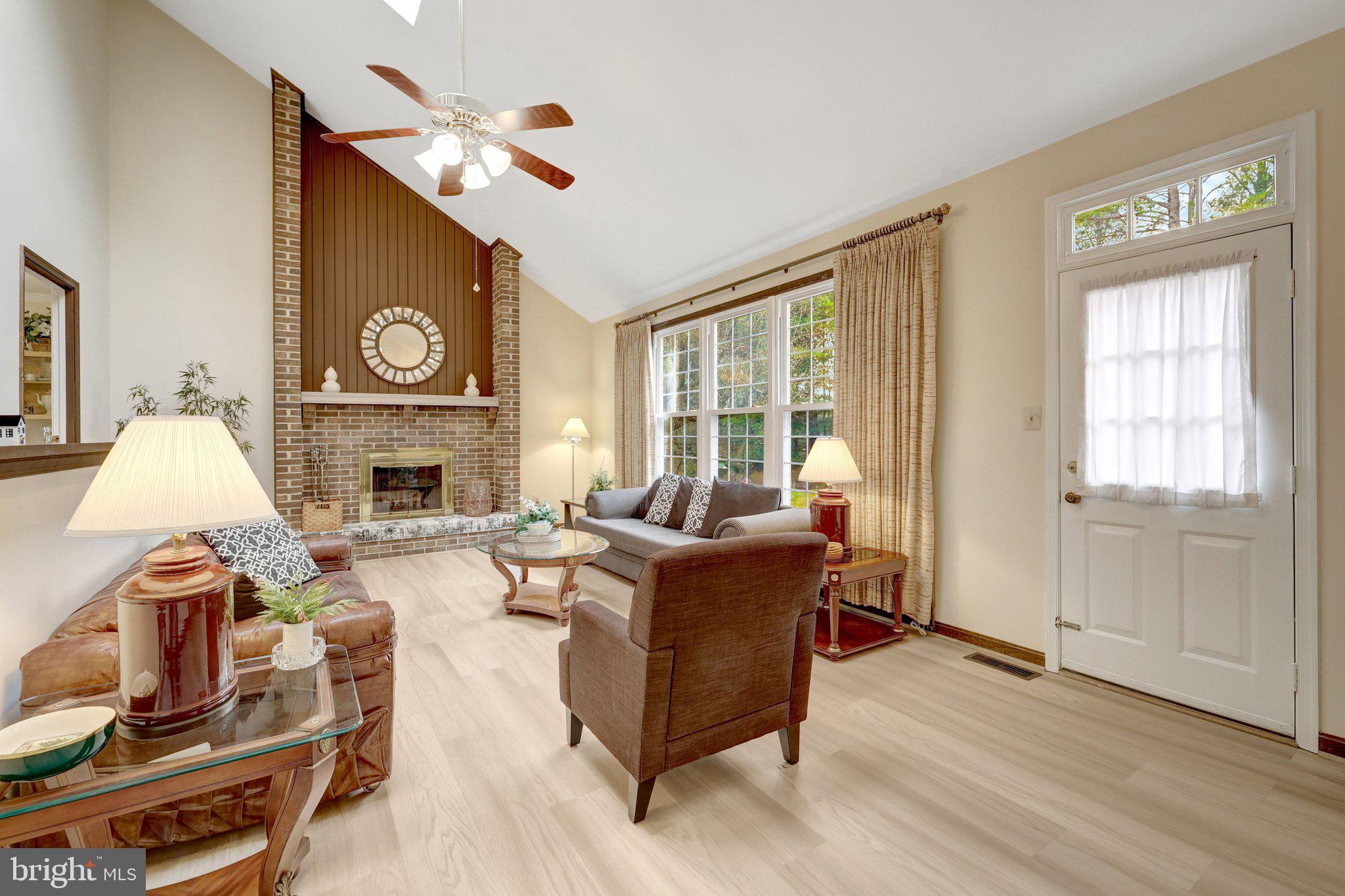 1398 Park Lake Drive Reston, VA 20190 - Photo 11 of 64 a living room with furniture and a fireplace