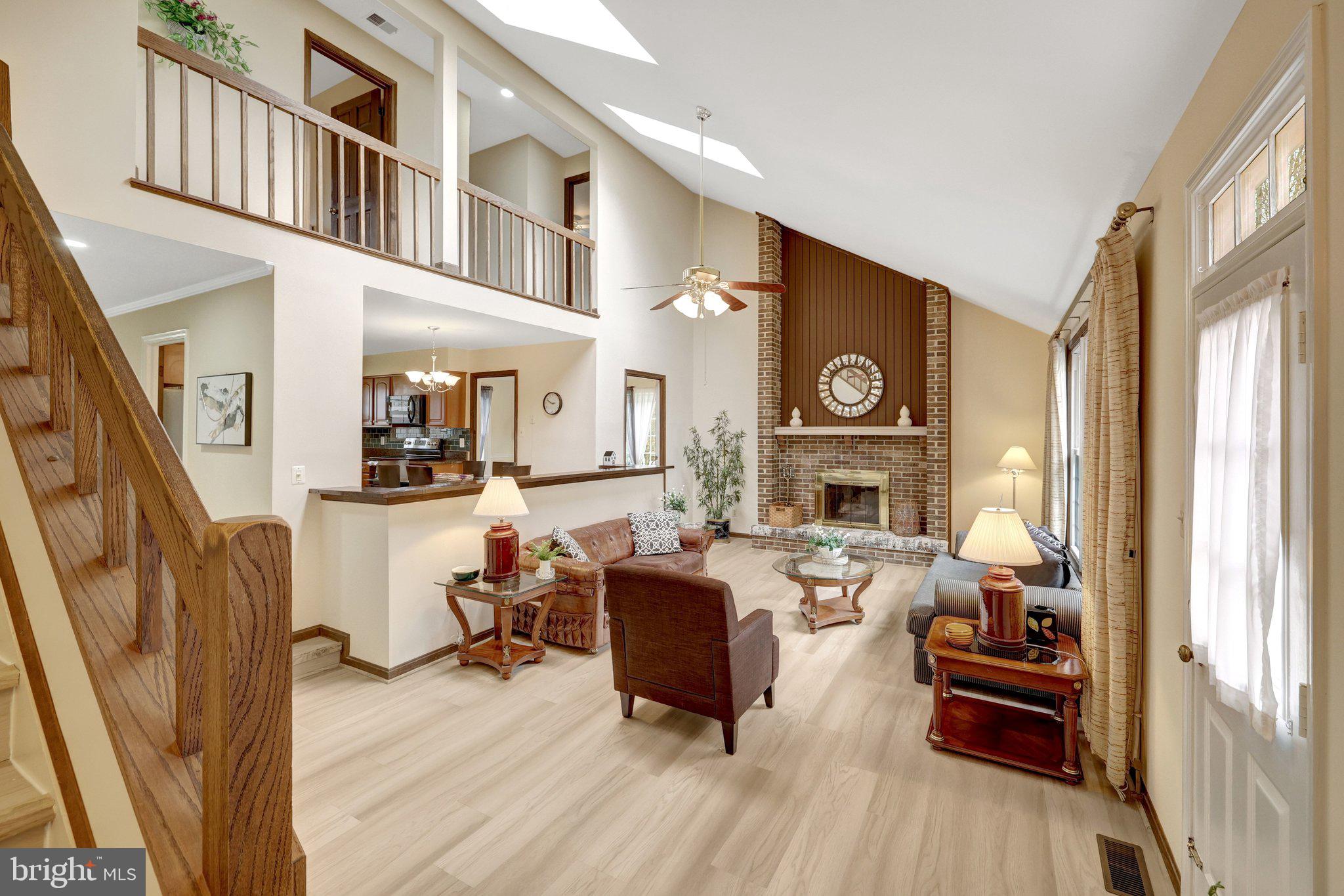 1398 Park Lake Drive Reston, VA 20190 - Photo 12 of 64 a living room with fireplace furniture and a wooden floor
