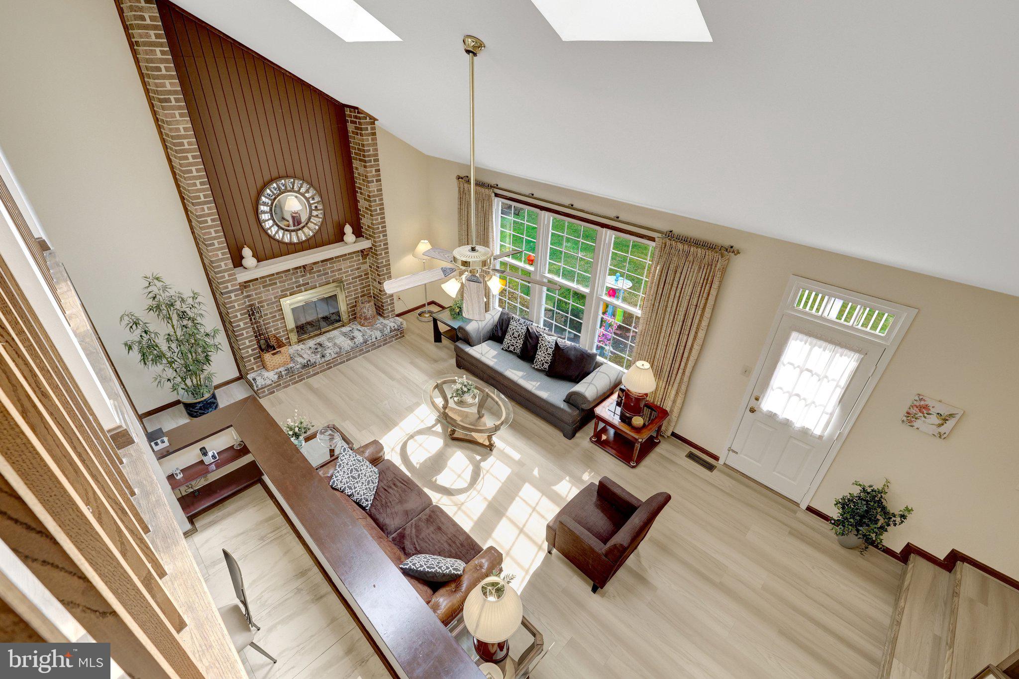 1398 Park Lake Drive Reston, VA 20190 - Photo 14 of 64 a living room with furniture and a fireplace