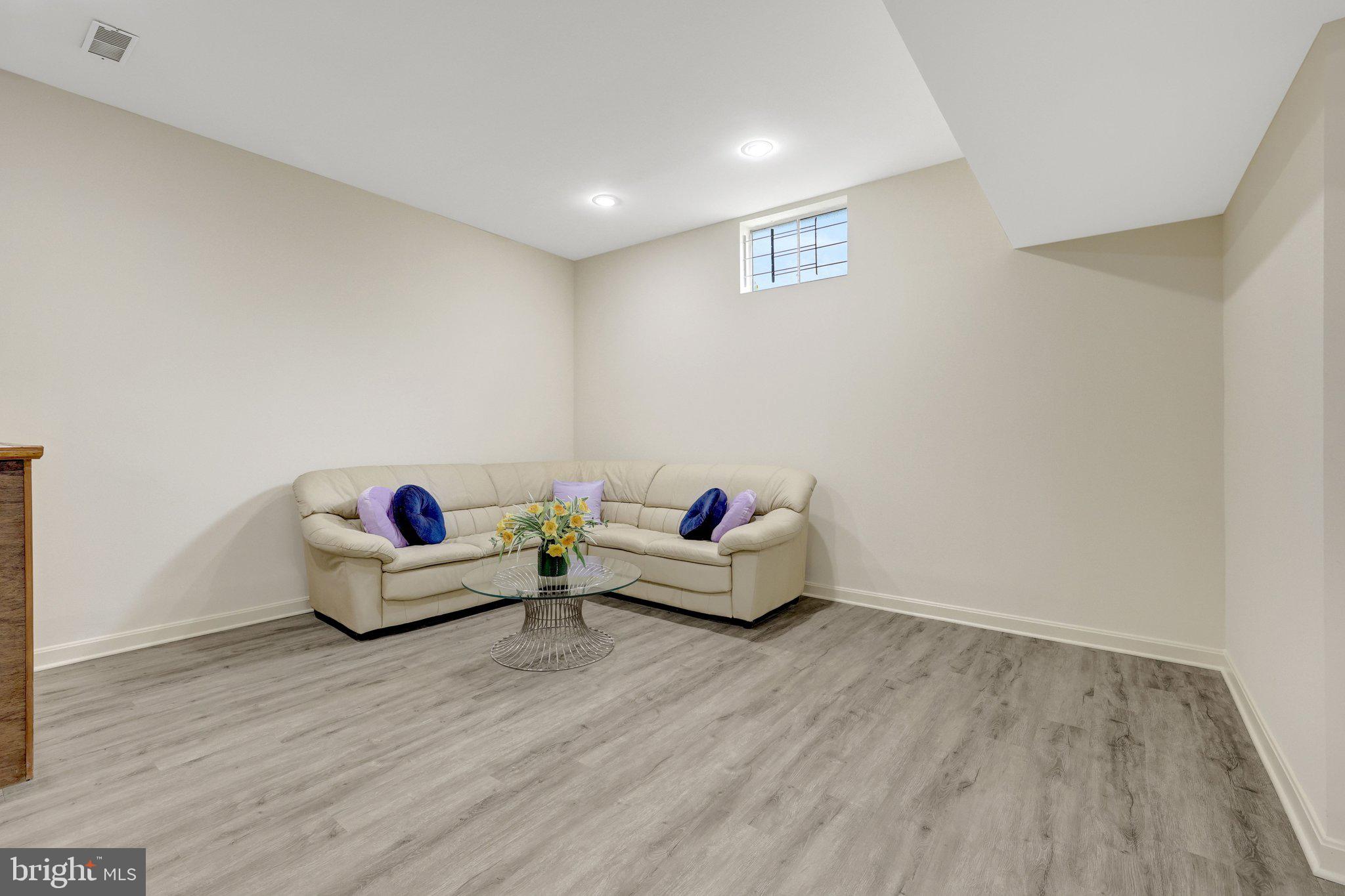 1398 Park Lake Drive Reston, VA 20190 - Photo 43 of 64 a living room with hard wood flooring and a wooden floor