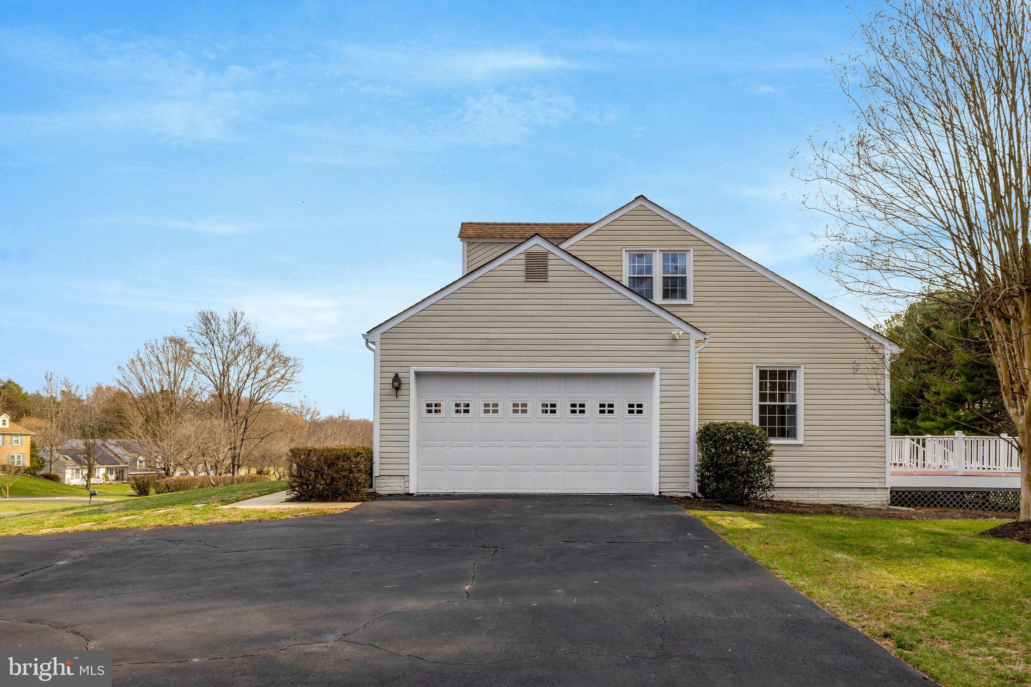 1398 Park Lake Drive Reston, VA 20190 - Photo 52 of 64 a view of a house with a yard