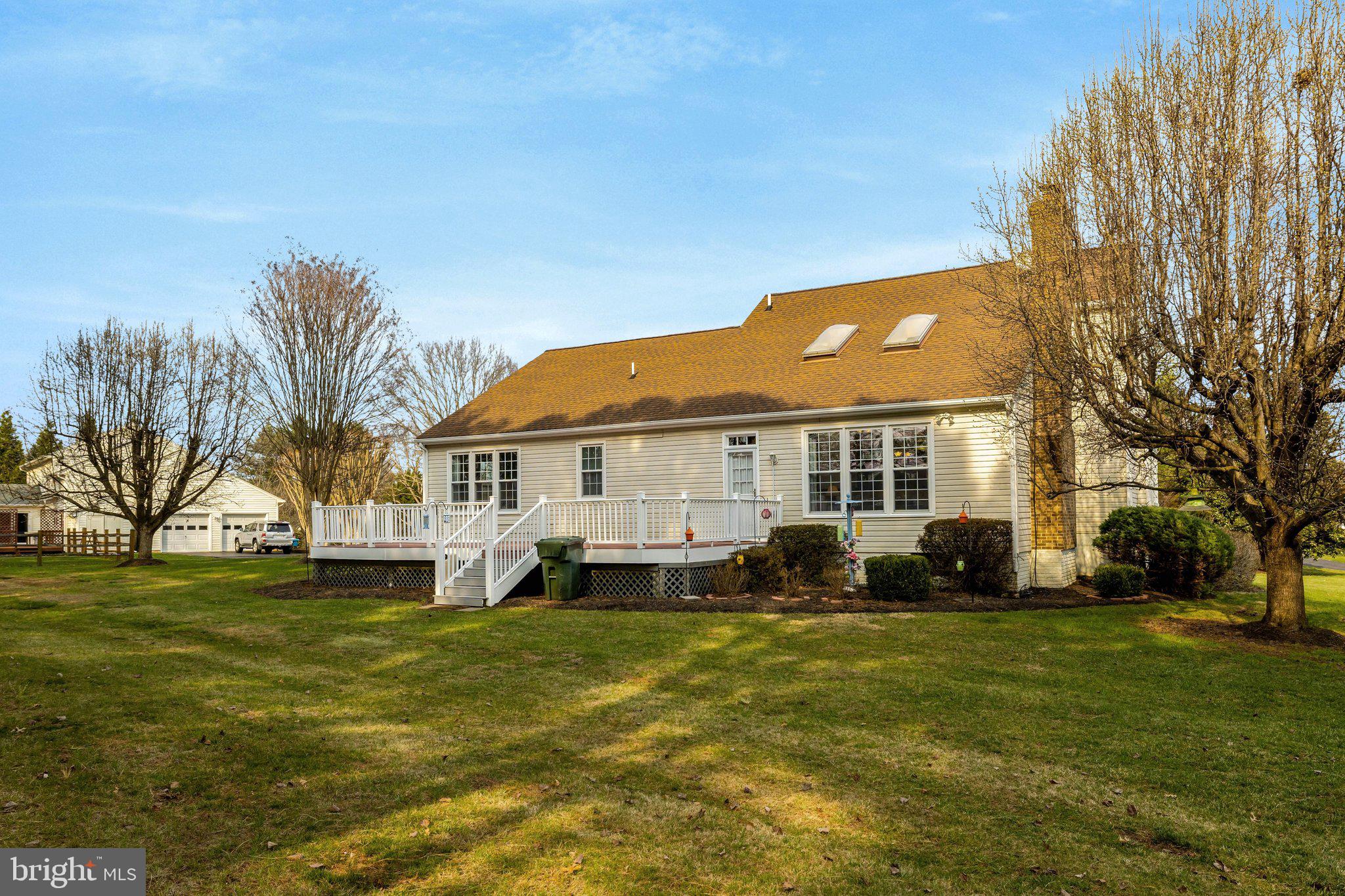 1398 Park Lake Drive Reston, VA 20190 - Photo 54 of 64 a front view of a house with a yard porch and sitting area