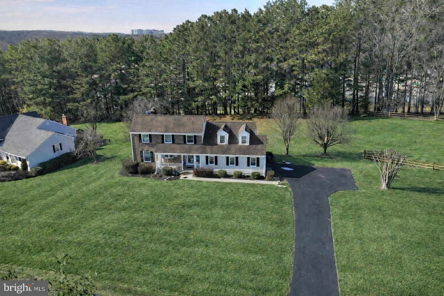 1398 Park Lake Drive Reston, VA 20190 - Photo 58 of 64 an aerial view of a house with porch yard basket ball court and trampoline