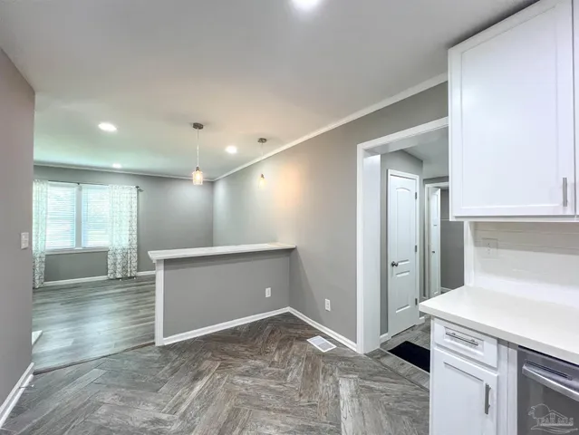 a view of livingroom with kitchen