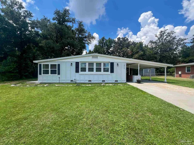a house view with a garden space