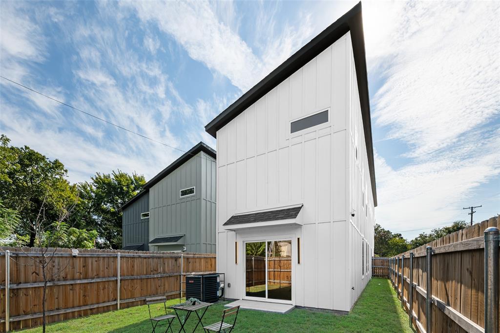 2701 Birmingham Avenue Dallas, TX 75215 - Photo 19 of 21 a front view of a house with garden