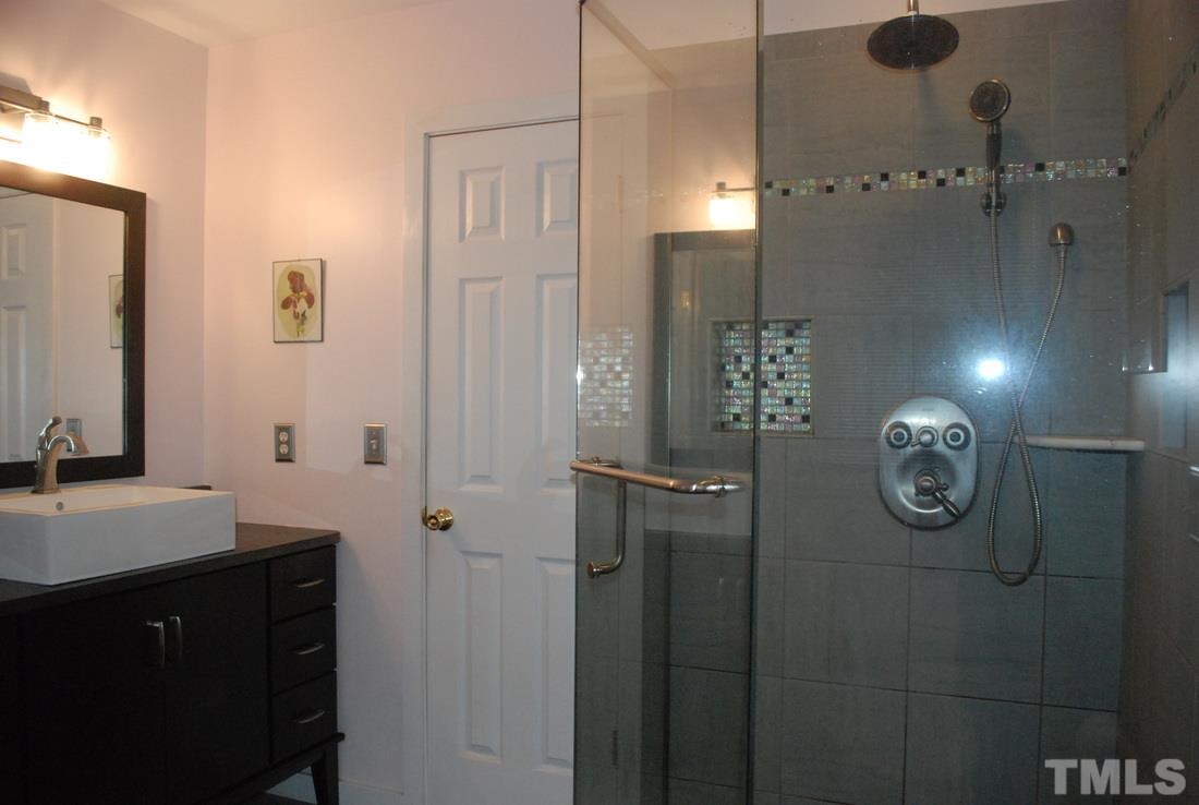 610 Manor Ridge Road Carrboro, NC 27510 - Photo 13 of 24 The beautiful master bathroom was recently renovated.