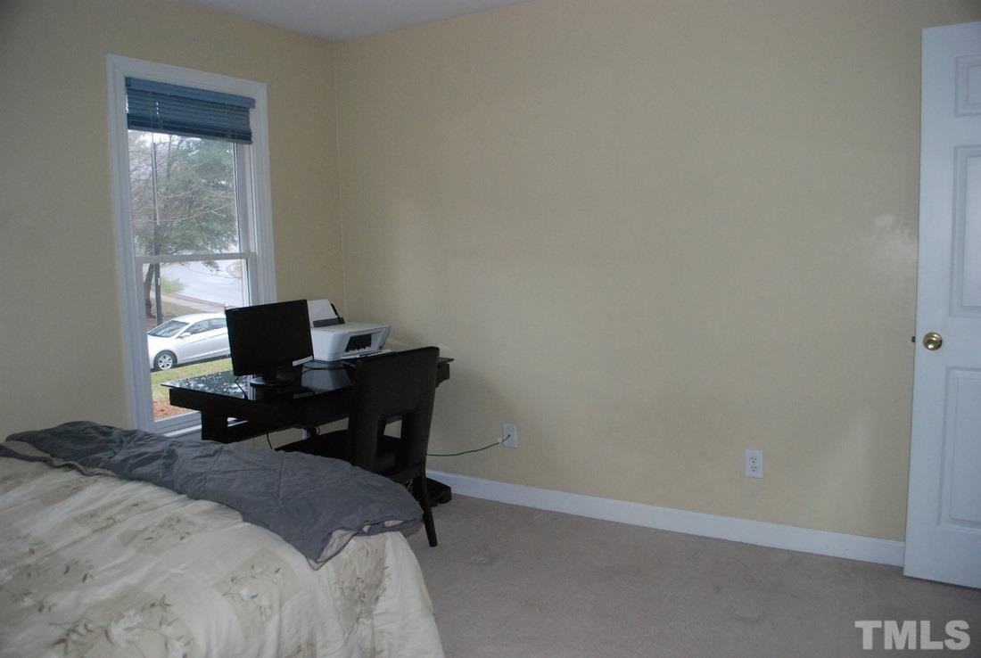 610 Manor Ridge Road Carrboro, NC 27510 - Photo 18 of 24 One of the secondary bedrooms upstairs.