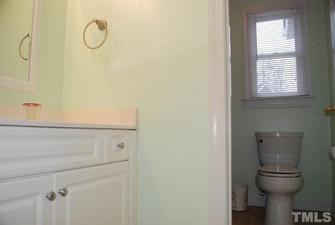 610 Manor Ridge Road Carrboro, NC 27510 - Photo 19 of 24 Separation of the vanity area makes this bathroom ideal for more than one family member to share.