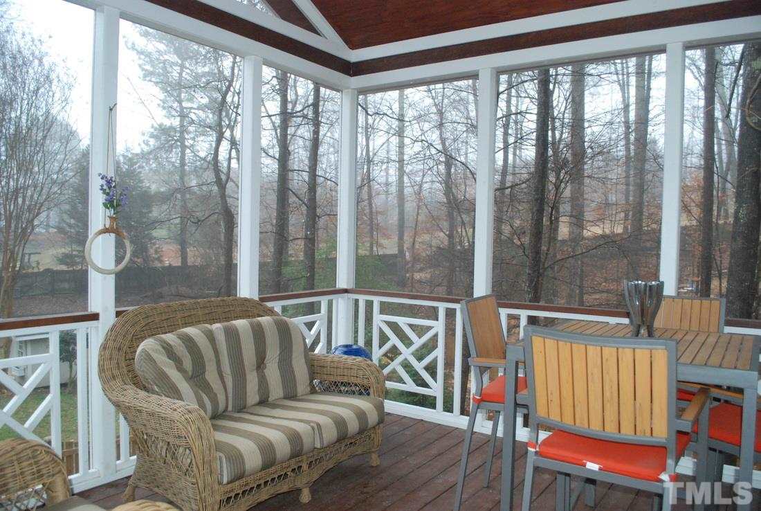 610 Manor Ridge Road Carrboro, NC 27510 - Photo 20 of 24 Relax on this screened porch overlooking the backyard.