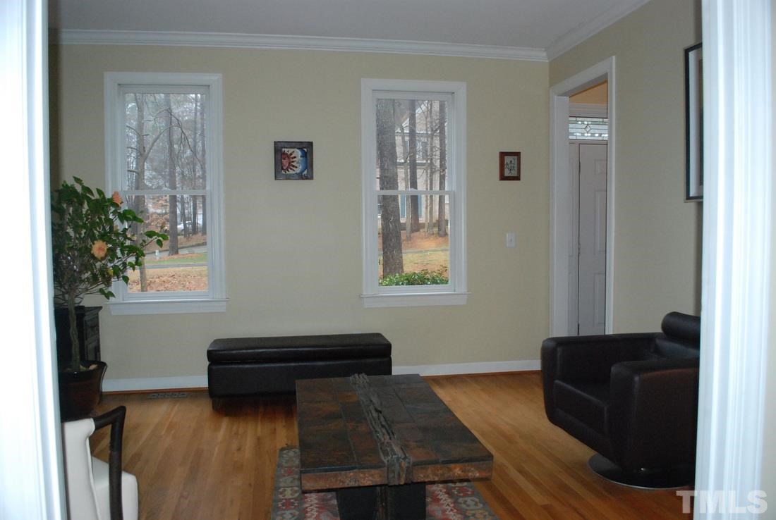 610 Manor Ridge Road Carrboro, NC 27510 - Photo 4 of 24 The bright living room is located to the right of the foyer.