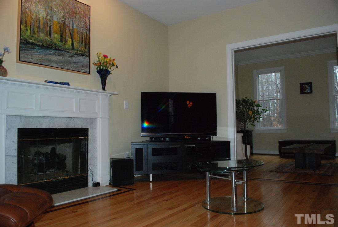 610 Manor Ridge Road Carrboro, NC 27510 - Photo 6 of 24 Family room with cozy fireplace.