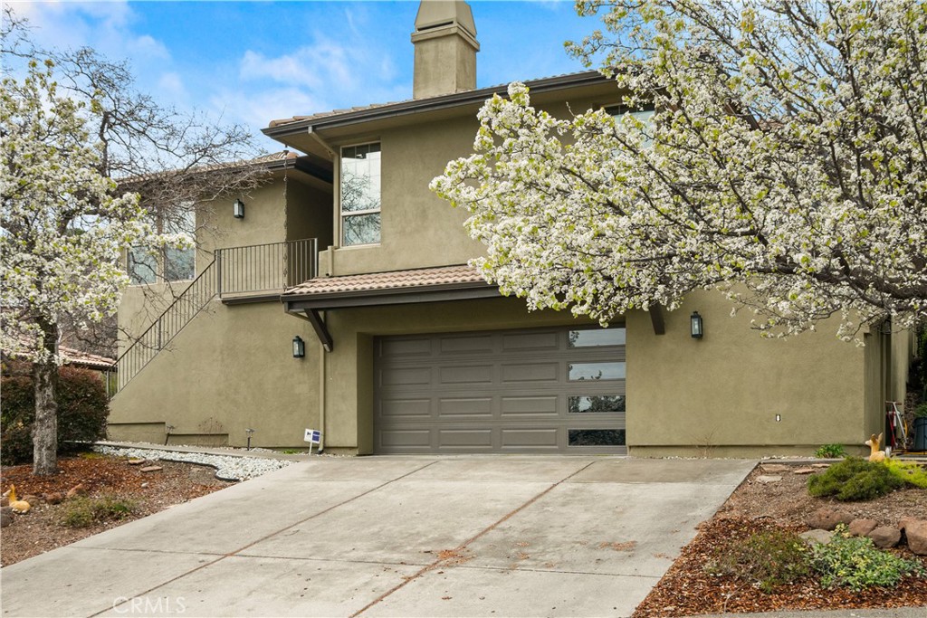 3512 Shadowtree Lane Chico, CA 95928 - Photo 1 of 1 a front view of a house with a garage