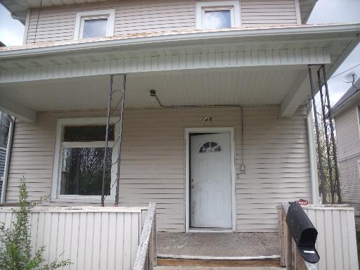748 Spring Street Aurora, IL 60505 - Photo 1 of 1 a front view of a house with a window
