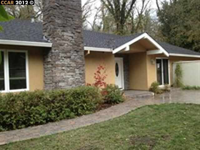 1244 Stone Valley Road Alamo, CA 94507 - Photo 1 of 1 a front view of a house with garden