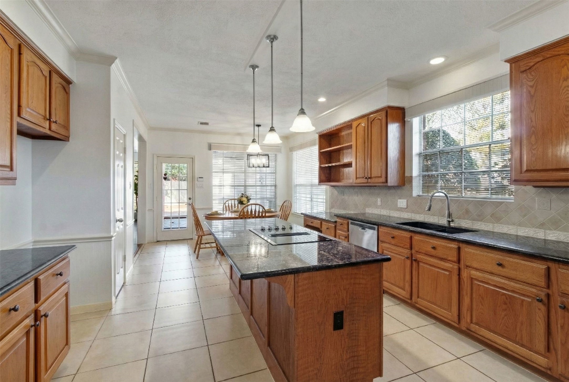5127 Heathfield Court Houston, TX 77084 - Photo 4 of 37 There is no shortage of cabinet space in this kitchen.