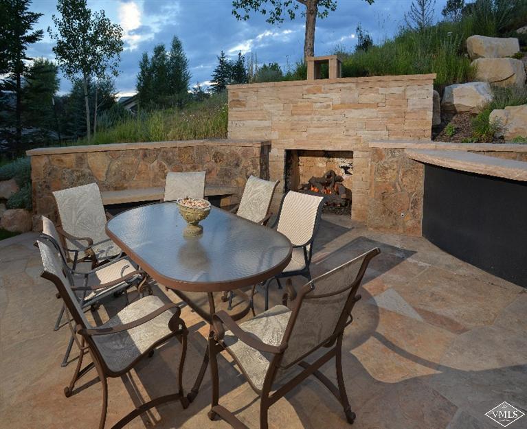 141 Mesquite Drive Edwards, CO 81632 - Photo 12 of 17 a view of a patio with table and chairs with wooden floor and fence