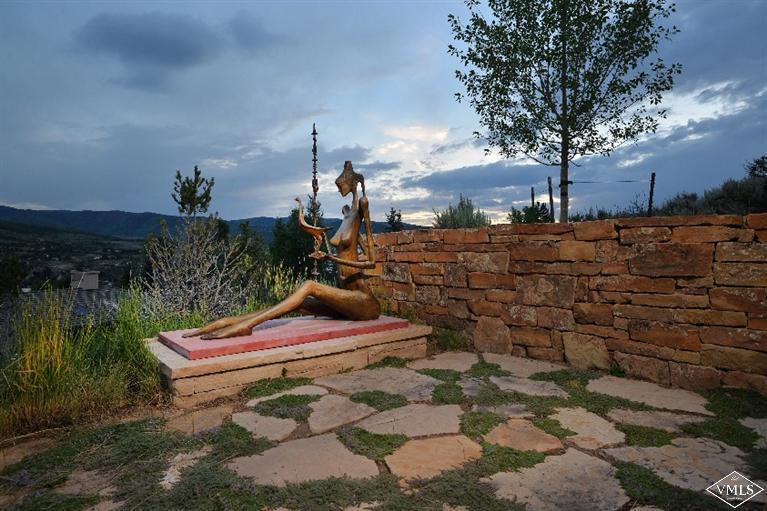 141 Mesquite Drive Edwards, CO 81632 - Photo 15 of 17 a backyard of a house with lots of green space
