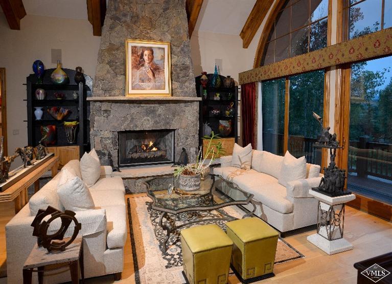 141 Mesquite Drive Edwards, CO 81632 - Photo 4 of 17 a living room with furniture and a fireplace