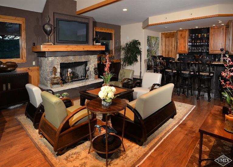 141 Mesquite Drive Edwards, CO 81632 - Photo 9 of 17 a living room with furniture and a fireplace