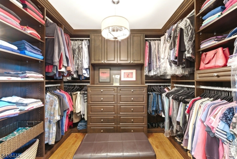 4 Windemere Way Sparta, NJ 07871 - Photo 28 of 50 a view of walk in closet with clothes