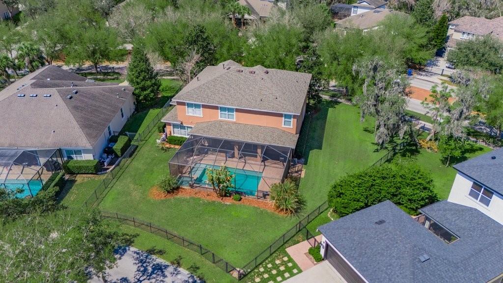 5920 Fishhawk Crossing Boulevard Lithia, FL 33547 - Photo 2 of 61 an aerial view of a house