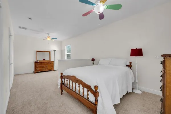 a view of a backyard with swimming pool