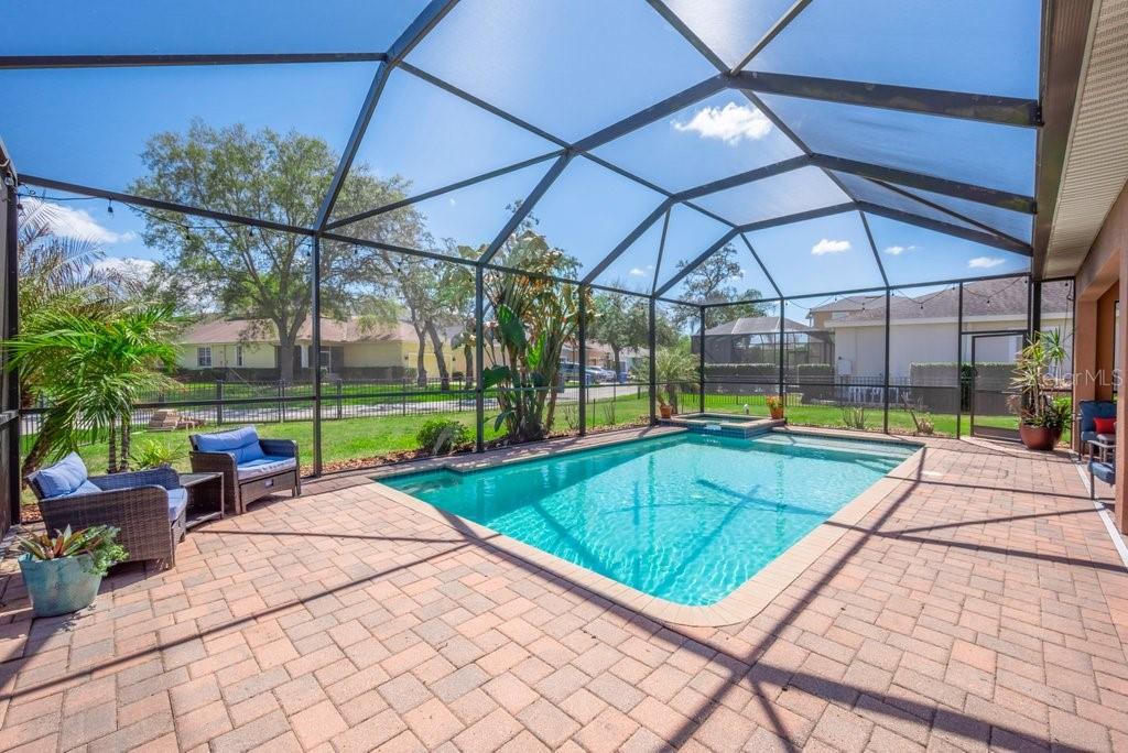 5920 Fishhawk Crossing Boulevard Lithia, FL 33547 - Photo 40 of 61 a view of a backyard with swimming pool